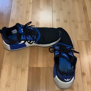 Black and blue NmD Nike shoes